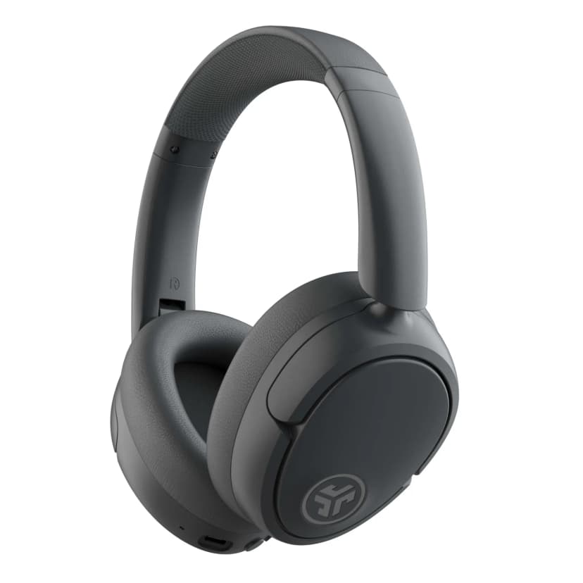 Three-quarter view of over-ear headphones with a circular logo on the ear cup and cushioned ear pads