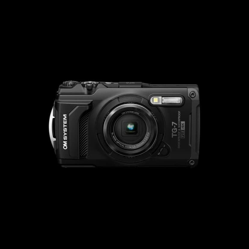 Front view of a compact rugged camera with a grip on the left, a zoom lens in the centre and a built-in flash, with TG-7 printed beside the lens